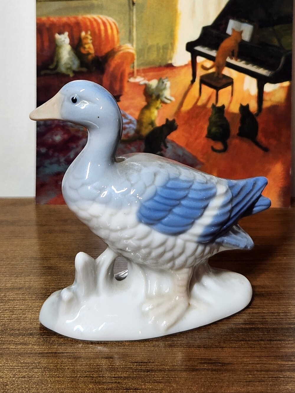 Cottagecore farmhouse small porcelain duck figurine with blue wing accents